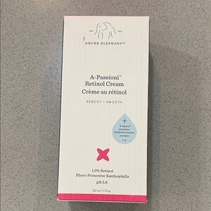 Drunk Elephant Retinol Cream with Pink Accents